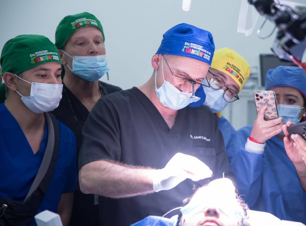Dr. Tsilosani guiding his team during hair transplant